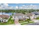 Stunning two-story home with brick accents, charming blue shutters, and a well-manicured front yard at 5416 Camberwell Ln, Riverview, FL 33578