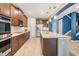 Spacious kitchen with stainless steel appliances, granite countertops, and a large center island at 5416 Camberwell Ln, Riverview, FL 33578