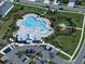 Aerial view showcases the community pool, playground, and lounge areas, providing diverse recreation options at 5547 Silver Sun Dr, Apollo Beach, FL 33572