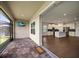 Open patio seamlessly connected to a well-equipped kitchen, ideal for indoor-outdoor living at 5547 Silver Sun Dr, Apollo Beach, FL 33572