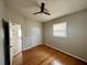 Bedroom with ceiling fan and hardwood floors at 5843 114Th N Ter, Pinellas Park, FL 33782