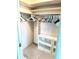 Well-organized walk-in closet with ample shelving and hanging space at 6880 Versailles N, Pinellas Park, FL 33781