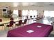 Game room with billiards table, sitting area and tables for group activities at 6880 Versailles N, Pinellas Park, FL 33781