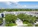 Aerial view of community with fountain, landscaping and downtown in distance at 800 S Dakota Ave # 241, Tampa, FL 33606
