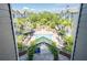 Aerial shot of the pool area with lounge chairs in a condominium community at 800 S Dakota Ave # 241, Tampa, FL 33606