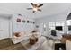 Comfortable living room features a workspace, natural light, and a cozy atmosphere at 800 S Dakota Ave # 241, Tampa, FL 33606
