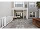 Inviting outdoor patio with a comfortable seating area and tiled flooring, perfect for relaxing or entertaining at 800 S Dakota Ave # 241, Tampa, FL 33606