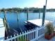 Waterfront views from the dock provide a serene setting for this beautiful property at 8025 Island Dr, Port Richey, FL 34668