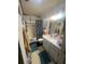 Modest bathroom featuring essential fixtures and necessities at 8203 N Semmes St, Tampa, FL 33604