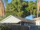 Charming single-story home featuring mature trees at 8203 N Semmes St, Tampa, FL 33604