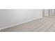Clean, bright carpeting with white baseboards at 9066 Rally Spring Loop, Wesley Chapel, FL 33545