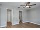 Bedroom with closet and bathroom featuring tile shower at 9500 Green Needle Dr, New Port Richey, FL 34655