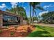 Welcome to Timber Greens, a beautiful community featuring lush landscaping and a welcoming entrance sign at 9500 Green Needle Dr, New Port Richey, FL 34655
