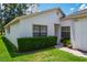Close up exterior shot with green lawn at 9500 Green Needle Dr, New Port Richey, FL 34655