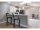 Open kitchen layout with a skylight above at 9500 Green Needle Dr, New Port Richey, FL 34655