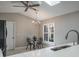 Bright kitchen featuring a breakfast nook, skylight, and stainless steel appliances at 9500 Green Needle Dr, New Port Richey, FL 34655