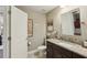 Well-lit bathroom with granite countertops, modern fixtures, and a convenient toilet for everyday comfort at 1014 7Th Street N, St Petersburg, FL 33701