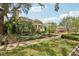 Inviting home with manicured front yard, lush greenery, and charming curb appeal at 1014 7Th Street N, St Petersburg, FL 33701