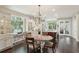 Bright, open kitchen features dark hardwood floors, a large island with seating, and stainless steel appliances at 1014 7Th Street N, St Petersburg, FL 33701