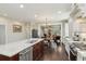 Bright, open kitchen adjacent to the living and dining areas of this home has modern appliances at 1014 7Th Street N, St Petersburg, FL 33701