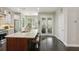 Beautiful kitchen with granite countertops, stainless steel appliances, and dark wood flooring at 1014 7Th Street N, St Petersburg, FL 33701