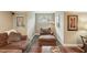 Comfortable seating in living room with decorative rug and stained glass lamp at 1014 7Th Street N, St Petersburg, FL 33701