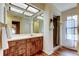 Bathroom with a shower and a vintage wood vanity at 107 Garland Cir, Palm Harbor, FL 34683