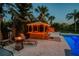 Backyard hot tub with fire pit at 11209 Spring St, Largo, FL 33774