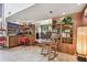 Living room with built-in bar, adjacent to dining area at 11209 Spring St, Largo, FL 33774