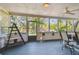 Enclosed patio showcasing a ceiling fan, and views of the lush outdoors at 11209 Spring St, Largo, FL 33774