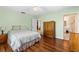 Bedroom featuring hardwood floors at 1140 Mcfarland St, Dunedin, FL 34698