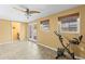 Bright bonus room with tile floors, natural lighting, and backyard access at 1140 Mcfarland St, Dunedin, FL 34698