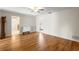 Inviting living room featuring hardwood floors and neutral wall colors at 1140 Mcfarland St, Dunedin, FL 34698