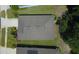 A high-angle view of the roof and surrounding landscaping at 11252 Merganser Way, New Port Richey, FL 34654