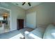 Bright bedroom with a closet and view into kitchen at 11252 Merganser Way, New Port Richey, FL 34654