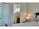 En suite bathroom featuring a toilet, sink and mirror, and plenty of space and natural light at 12327 Eagle Swoop Pl, Riverview, FL 33579