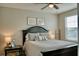 Relaxing bedroom featuring a comfortable bed, soft lighting, and a serene atmosphere for restful nights at 12327 Eagle Swoop Pl, Riverview, FL 33579
