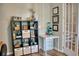 Functional office space with stylish shelves and a compact table with storage drawers at 12327 Eagle Swoop Pl, Riverview, FL 33579