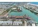 Beautiful waterfront community featuring a canal and neatly landscaped grounds from an aerial view at 12360 Capri N Cir # 106, Treasure Island, FL 33706