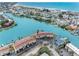 A waterfront condo complex with boat docks, beautiful landscaping, and views of the bay at 12360 Capri N Cir # 106, Treasure Island, FL 33706