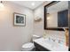 Stylish half bath with modern fixtures and decor at 12360 Capri N Cir # 106, Treasure Island, FL 33706