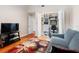 This bedroom features a sofa and a built in desk at 12360 Capri N Cir # 106, Treasure Island, FL 33706