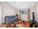 This bedroom features a sofa and lots of natural light at 12360 Capri N Cir # 106, Treasure Island, FL 33706