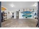 Large garage space with surf boards, kayaks, and laundry at 12360 Capri N Cir # 106, Treasure Island, FL 33706
