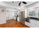 Bright modern kitchen with stainless steel appliances and white cabinetry at 12360 Capri N Cir # 106, Treasure Island, FL 33706