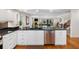Modern kitchen with stainless steel appliances and plenty of counter space at 12360 Capri N Cir # 106, Treasure Island, FL 33706