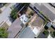 A backyard featuring a pool, outdoor seating, and lush landscaping at 12595 95Th N St, Largo, FL 33773