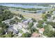 An aerial view of a neighborhood showcasing the proximity to a beautiful lake at 12595 95Th N St, Largo, FL 33773