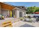 Charming backyard with a patio, surfboard storage, and outdoor furniture for relaxing and entertaining at 12595 95Th N St, Largo, FL 33773