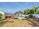 Expansive backyard with a patio, hot tub, seating, and lush landscaping, perfect for outdoor living at 12595 95Th N St, Largo, FL 33773